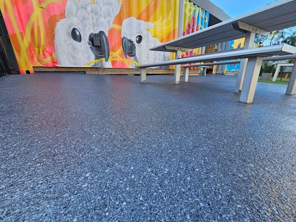 A school playground with Hyper Flake Basalt on Dark Grey