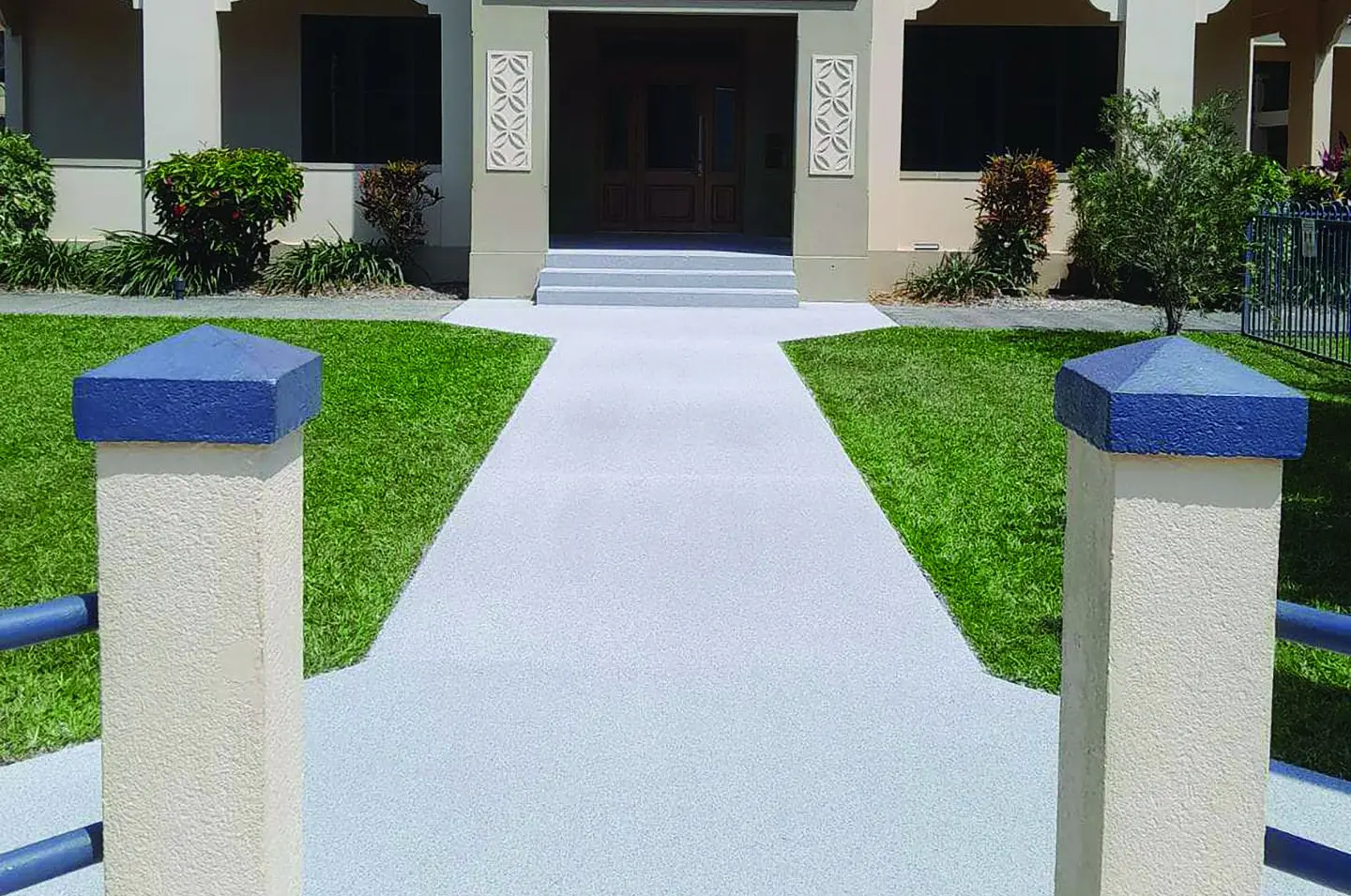 A school outdoor courtyard with Quartz Shield Silver on Pipeline Grey